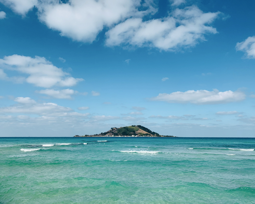 Crystal-clear coastal waters of Jeju Island, South Korea.
