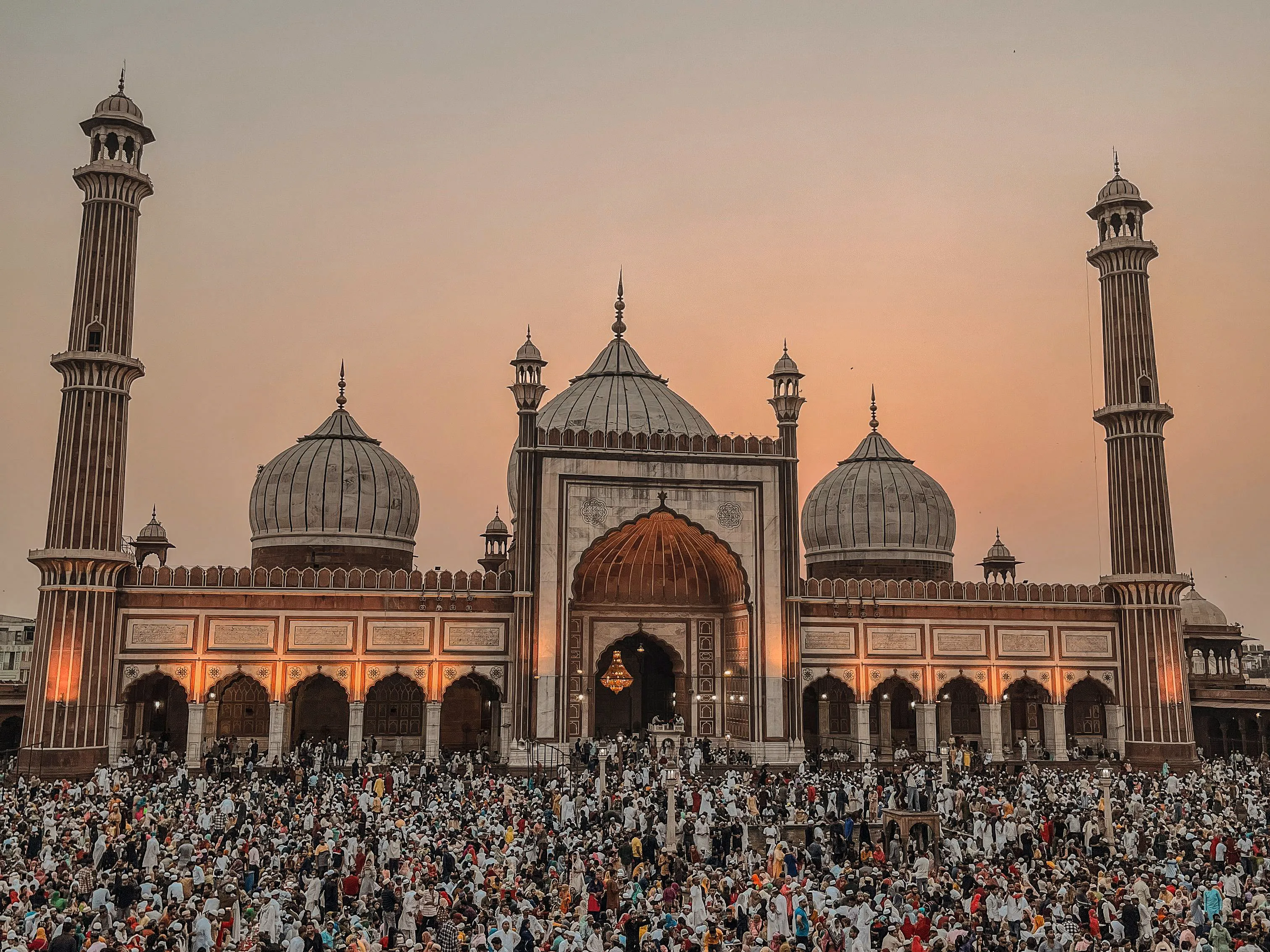 Large community gathering at a mosque in India during Eid-ul-Fitr celebrations.