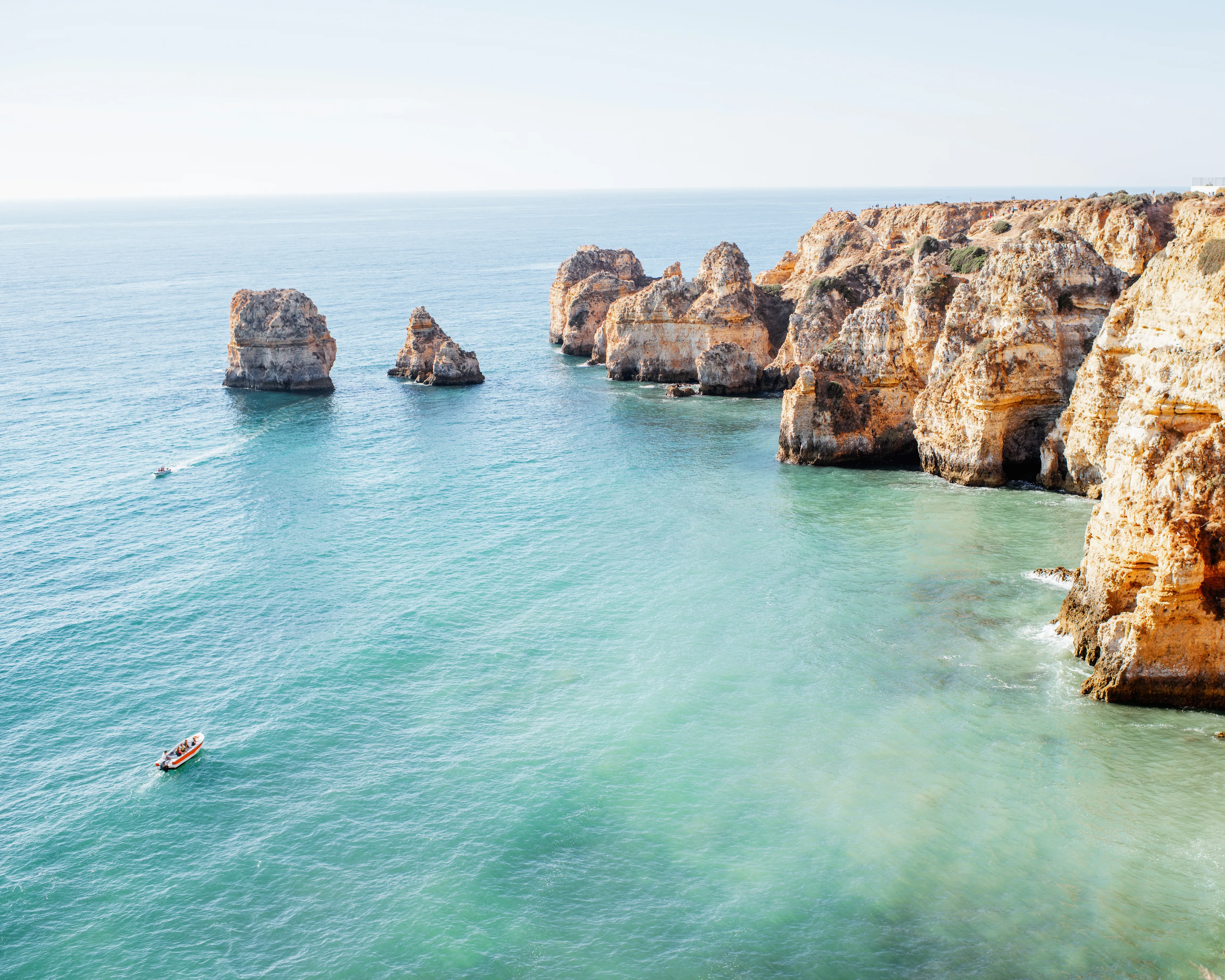 Turquoise coastline and limestone cliffs in Turkey, a popular September destination for Australian travellers seeking beaches and cultural experiences.